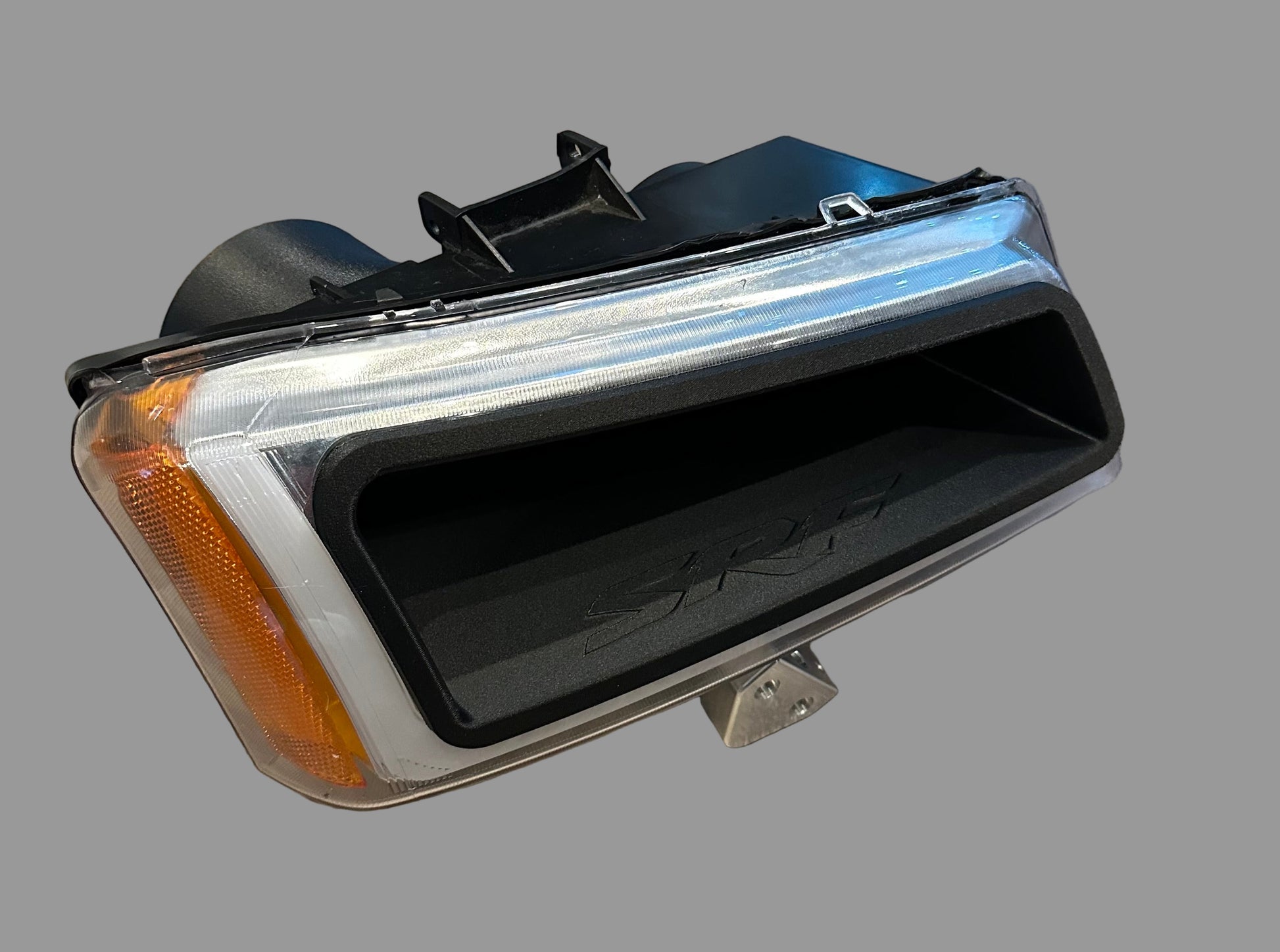 Passenger side LED headlight with integrated 3D-printed turbo air inlet for 2003–2006 Chevy Silverado manufactured by Square Root Fabrication