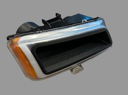 Passenger side LED headlight with integrated 3D-printed turbo air inlet for 2003–2006 Chevy Silverado manufactured by Square Root Fabrication