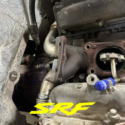 L5P Duramax engine showing new stainless up pipe and SRF S220 up pipe studs mounted