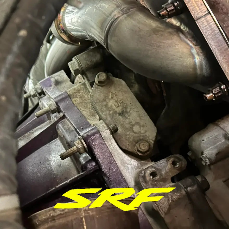 L5P Duramax engine showing new stainless up pipe and SRF S220 up pipe studs mounted