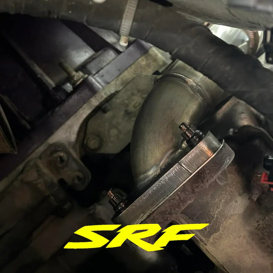 L5P Duramax engine showing new stainless up pipe and SRF S220 up pipe studs mounted