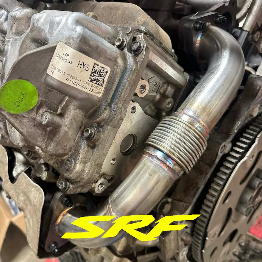 L5P Duramax engine showing new stainless up pipe and SRF S220 up pipe studs mounted
